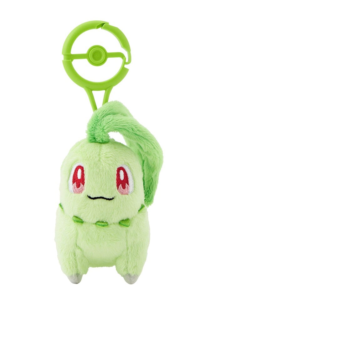 A green Chikorita plush toy with a carabiner attached to it.